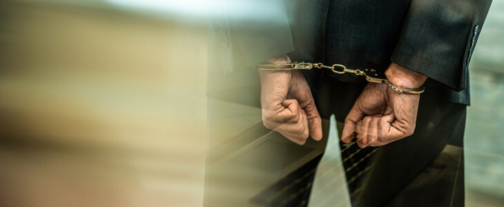 A businessman arrested for committing white collar crime